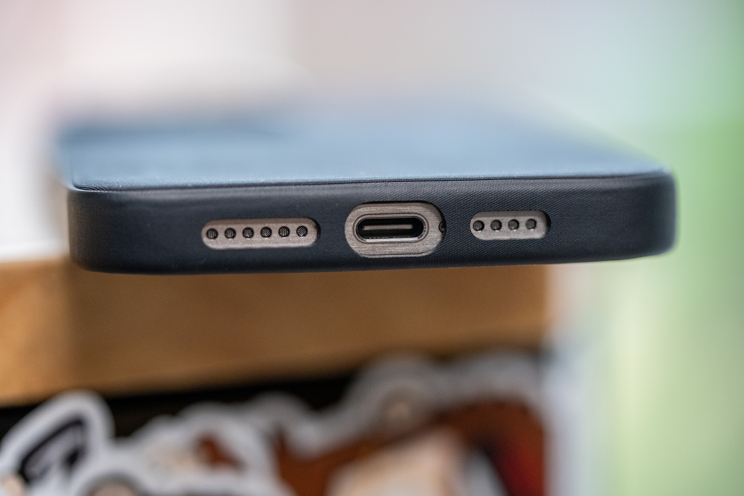 FineWoven case with misaligned port
